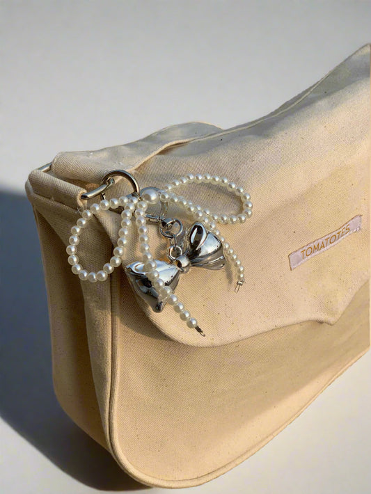 Double Bow Pearl Charm