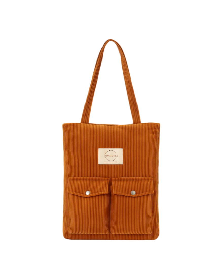 Brown corduroy tote bag with two front pockets on a white background
