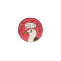Pin with a duck illustration and text 'Who Run The World? Gulls' on a wooden surface