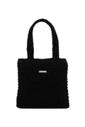 Black textured handbag on a white background